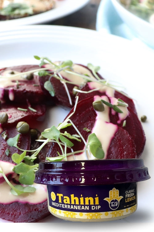 Earthy Roasted Beets on a plate with Tal's Tahini Mediterranean Dip Classic Fresh Lemon featured