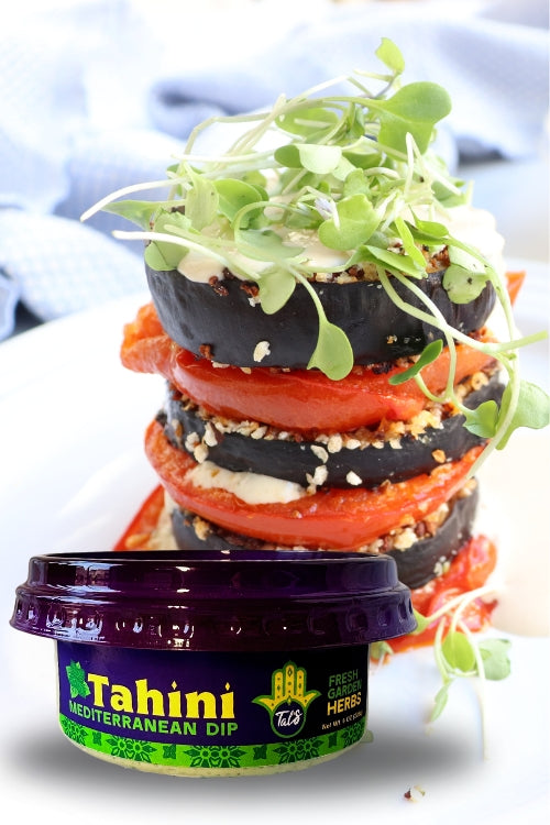 Eggplant Tower on a plate, featuring Tal's Mediterranean Tahini Mediterranean Dip in the Fresh Garden Herbs flavor