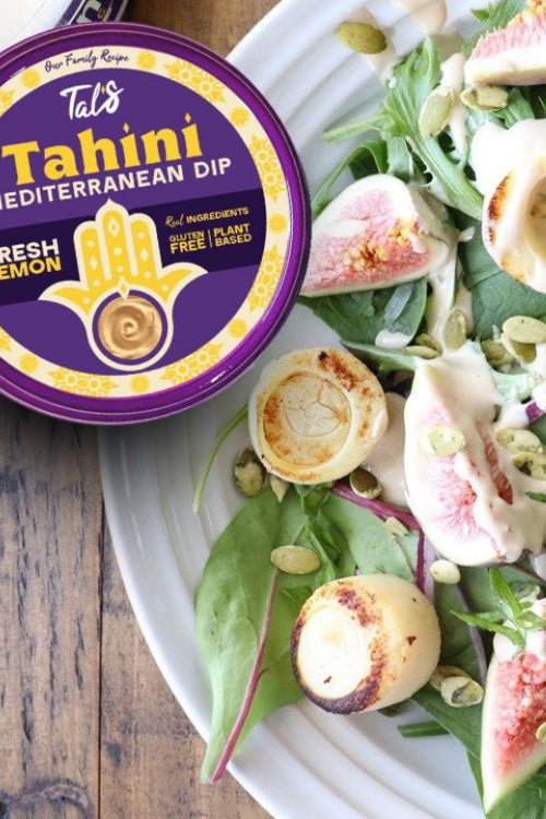 Mediterranean Green Mix on a plate with Tal's Tahini Mediterranean Dip in Fresh Lemon flavor